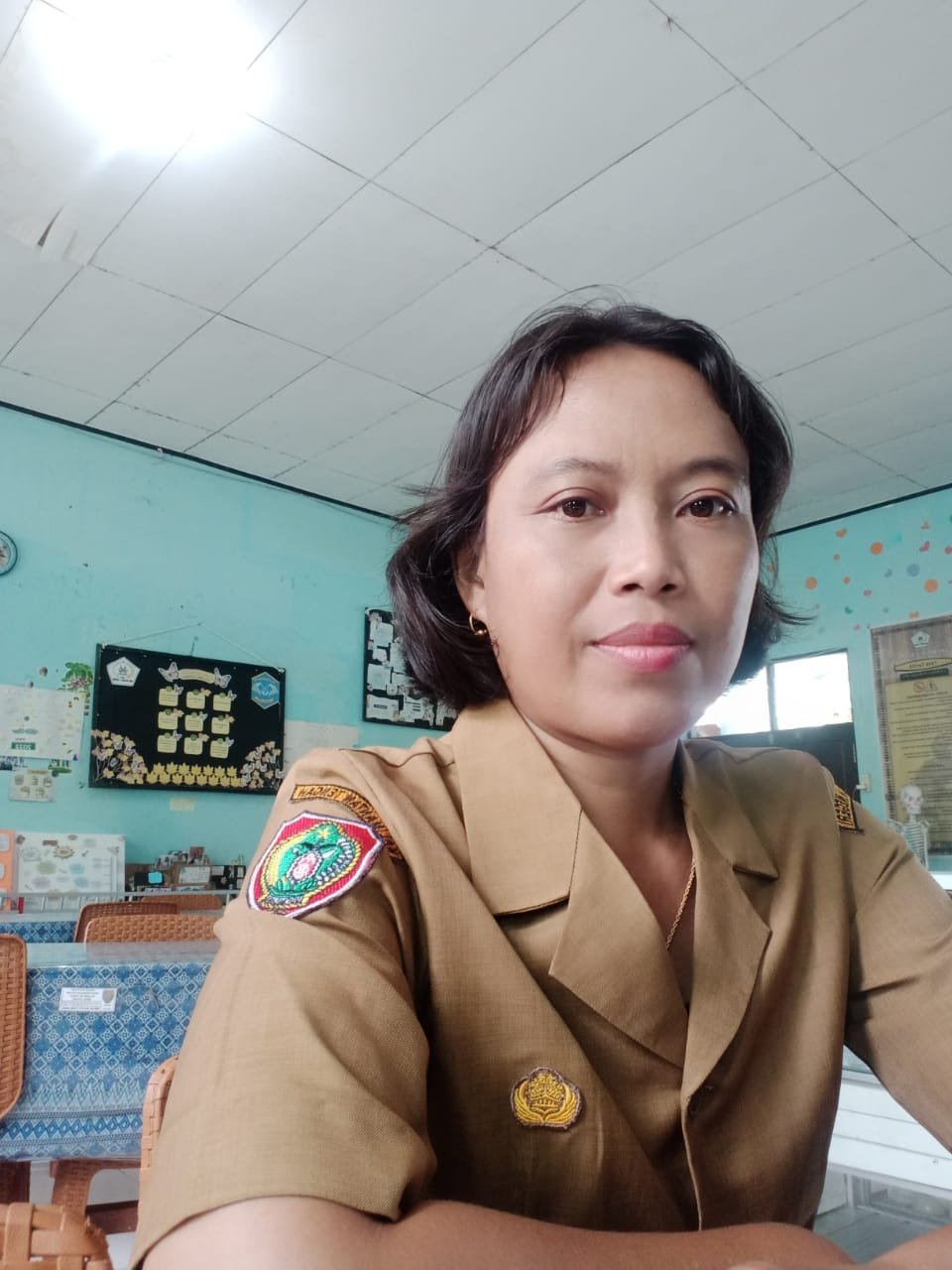 Evie Berlianti Hermina, S.Pd.